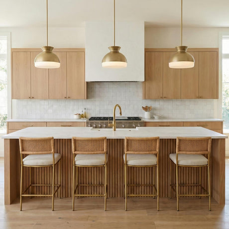 Elody Medium Pendant 15", Brass globe pendant in a Modern Farmhouse Kitchen with a white marble island and rattan bar stools.