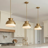 Elody Medium Pendant 15", Brass globe design Pendant in a Transitional Kitchen with a white marble island and brass faucet.