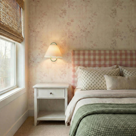 Lucia Wall Sconce 12", Sage Green geometric Wall Sconce in a Cottage Bedroom with a pink gingham headboard and floral wallpaper.