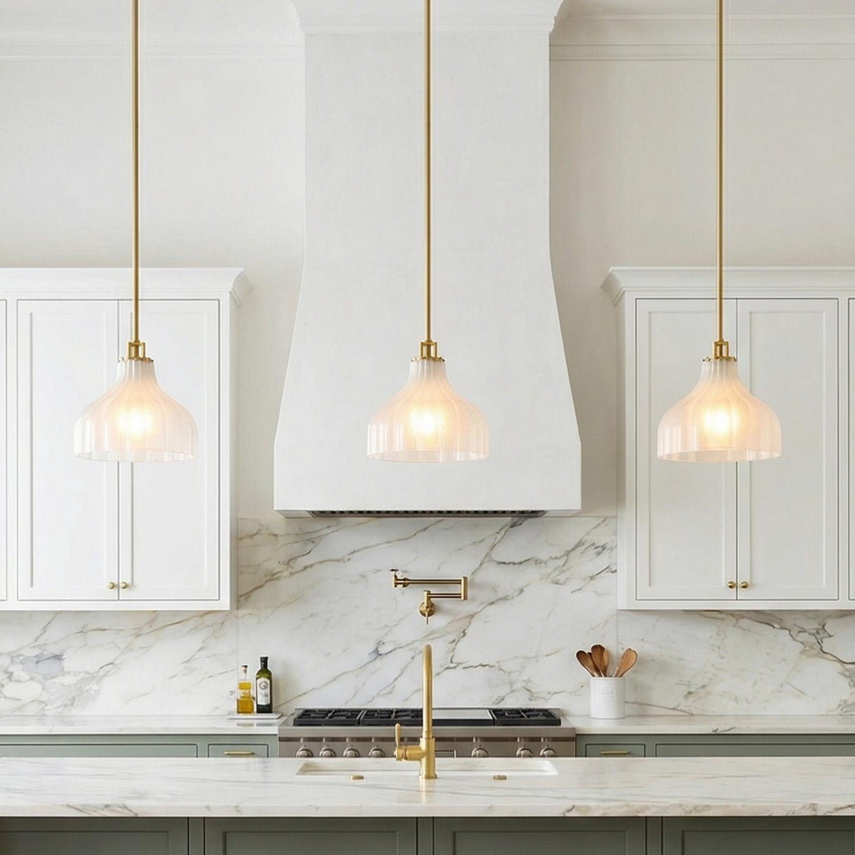 Claire Small Pendant 10", Brass and Strie Glass scalloped Pendant in a Transitional Kitchen with white marble island and backsplash.