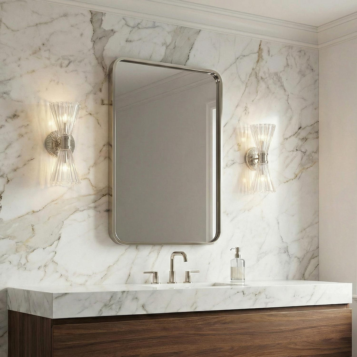 Eliza 2 Light Vanity, Polished Nickel and Clear Ribbed Glass geometric Vanity in a Contemporary Bathroom with a white marble wall.
