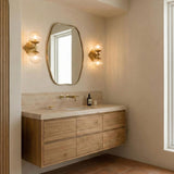 Victoria 2 Light Wall Sconce 16", Aged Brass and Clear Ribbed Glass scalloped Wall Sconce in a Contemporary Bathroom with a wood vanity.