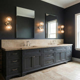 Victoria 2 Light Wall Sconce 16", Polished Nickel and Clear Ribbed Glass globe Wall Sconce in a Transitional Bathroom with a double vanity.