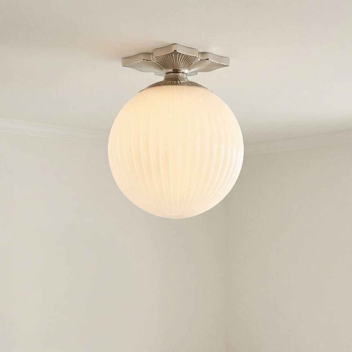 Victoria Semi-Flush 10", Polished Nickel and Opal Ribbed Glass globe Flush Mount in a Traditional Hallway with white crown molding.