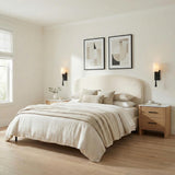 Kellan Wall Sconce 18", Black geometric Wall Sconce in a Transitional Bedroom with a cream upholstered headboard and oak nightstands.