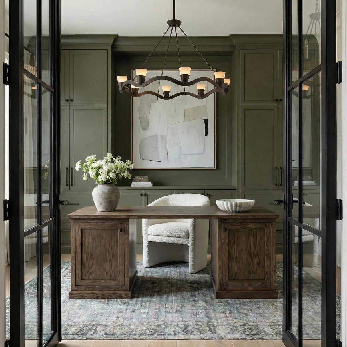 Josie LED Chandelier 39", Old Bronze and Alabaster scalloped Chandelier in a Modern Farmhouse Office with a rustic oak desk and bouclé chair.