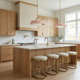Blaine Large Pendant 20", Brass and Rose Quartz globe pendant in a Contemporary Kitchen with a white marble island and wood cabinets.