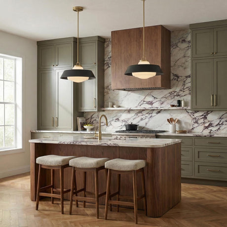 Blaine Large Pendant 20", Brass and Matte Black globe Pendant in a Transitional Kitchen with a marble island and green cabinets.