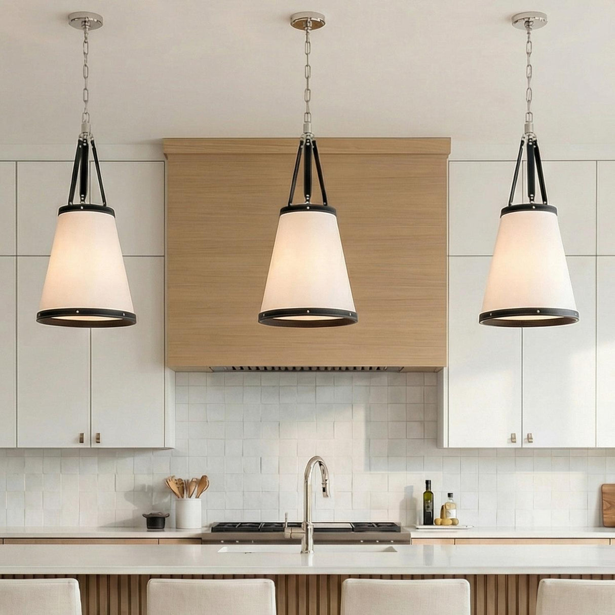 Spencer Small Pendant 14", Polished Nickel with Black Leather Accents geometric pendant in a Modern Farmhouse Kitchen with a white island.