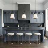 Spencer 14" Black and White geometric pendant in a Modern Farmhouse Kitchen with blue cabinets and a dark stone island.