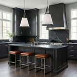 Spencer Tapered Pendant, Polished Nickel and Black Leather geometric Pendant in a Modern Farmhouse Kitchen with a black marble island.