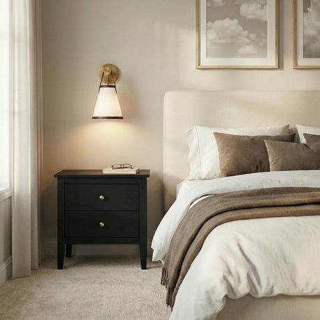 Spencer Wall Sconce, Brass with Brown Leather Accents geometric wall sconce in a Transitional Bedroom with a black nightstand.