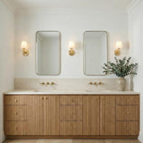 Atticus Wall Sconce, Brass and Opal Glass linear wall sconce in a Transitional Bathroom with a fluted wood double vanity.