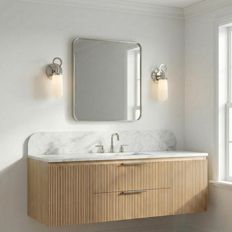 Finnian LED Wall Sconce 13", Polished Nickel geometric Wall Sconce in a Contemporary Bathroom with a fluted oak vanity and marble.