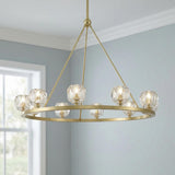 Silas 10 Light Ring Chandelier 36", Soft Brass and Faceted Crystal Brass globe Chandelier in a Transitional Dining Room with blue walls.