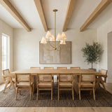 Yara 6 Light Chandelier 40", Patina Brass geometric Chandelier in a Transitional Dining Room with a rustic oak table and cane chairs.