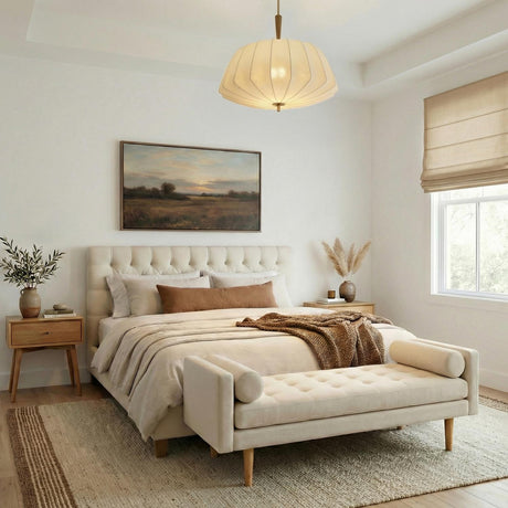 Winthrop Patina Brass scalloped fabric pendant in a Transitional Bedroom with a tufted headboard and natural wood nightstands.