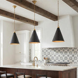 Ambrose Medium Pendant 15", Urban Bronze and Aged Brass geometric pendant in a Modern Farmhouse Kitchen with a white marble island.