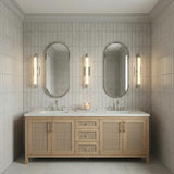 Empire LED Wall Sconce 28", Polished Nickel linear wall sconce in a Transitional Bathroom with a cane double vanity.