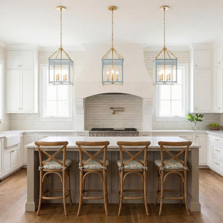 Roanne Medium Lantern Pendant 13", Light Blue and Aged Brass geometric lantern pendant in a Coastal Kitchen with a white marble island.