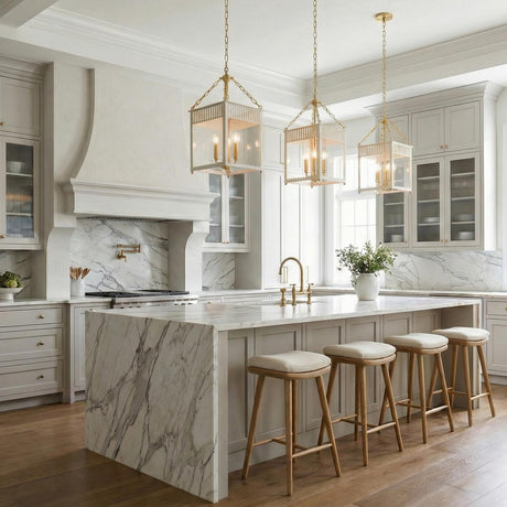 Roanne Medium Lantern Pendant 13", Cream and Aged Brass geometric Pendant in a Transitional Kitchen with a white marble island.