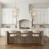 Roanne Large Lantern Pendant 17", Cream and Aged Brass geometric lantern pendant in a Transitional Kitchen with boucle bar stools.