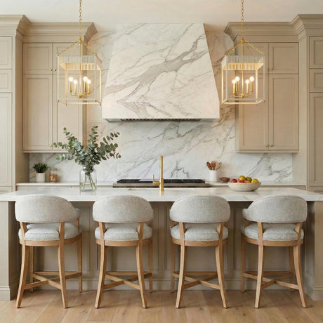 Roanne Large Lantern Pendant 17", Cream and Aged Brass geometric lantern pendant in a Transitional Kitchen with a white marble island.