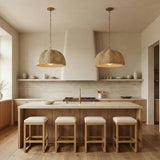 Santiago Large Pendant 24", Natural and Patina Brass woven Pendant in a Coastal Kitchen with a wooden island and plaster hood.