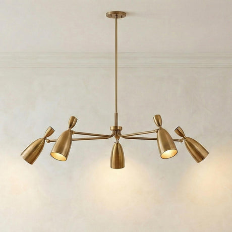 Hyla 5 Light Chandelier 50", Patina Brass geometric Chandelier in a Mid-Century Dining Room with a textured plaster wall.