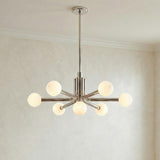 Maribel 7 Globe Chandelier 29", Polished Nickel globe Chandelier in a Modern Living Room with crown molding and neutral walls.