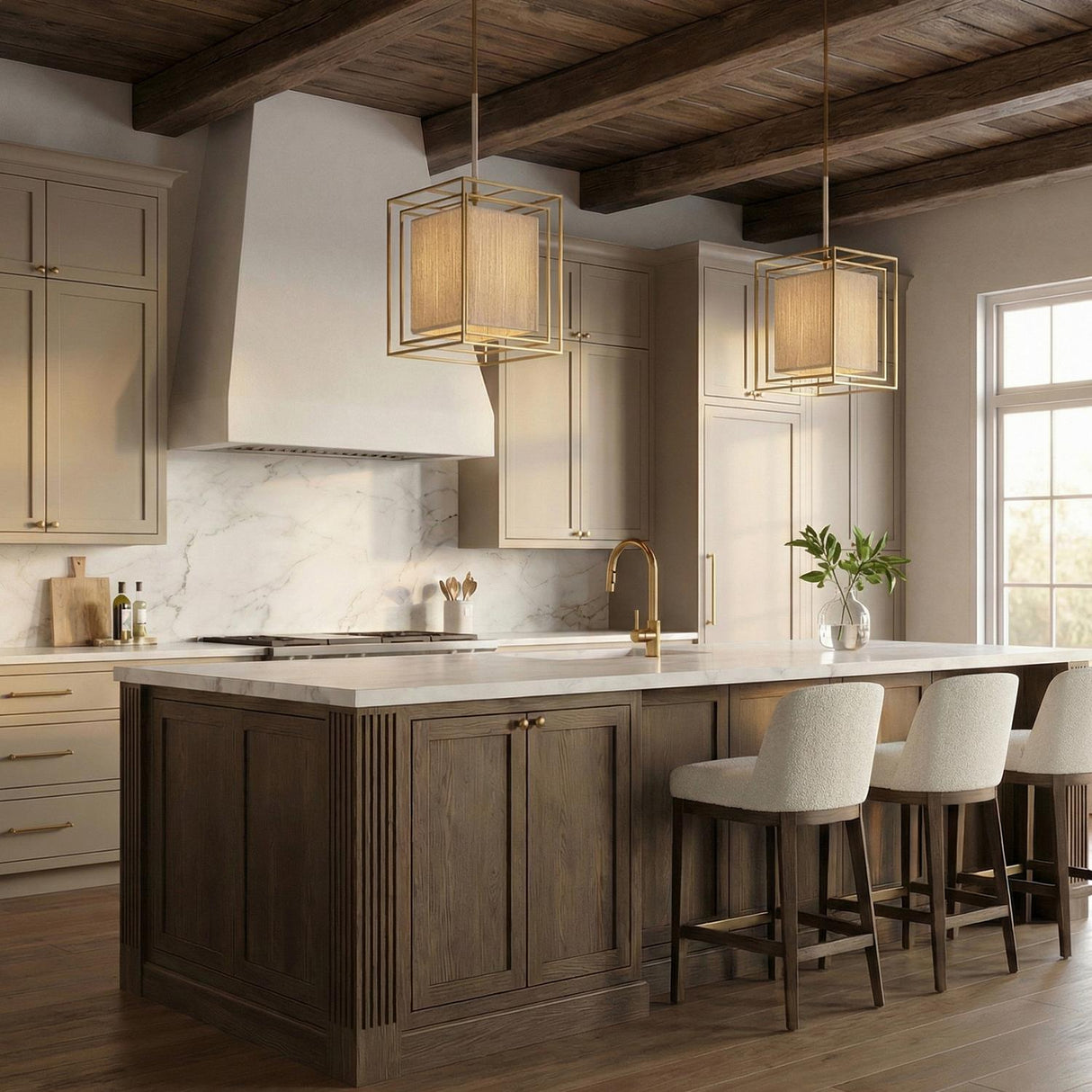 A transitional kitchen with two Tilda Tall Pendant 18", Brass and Natural Rope lanterns over a marble island featuring a dark wood base and beamed ceiling.