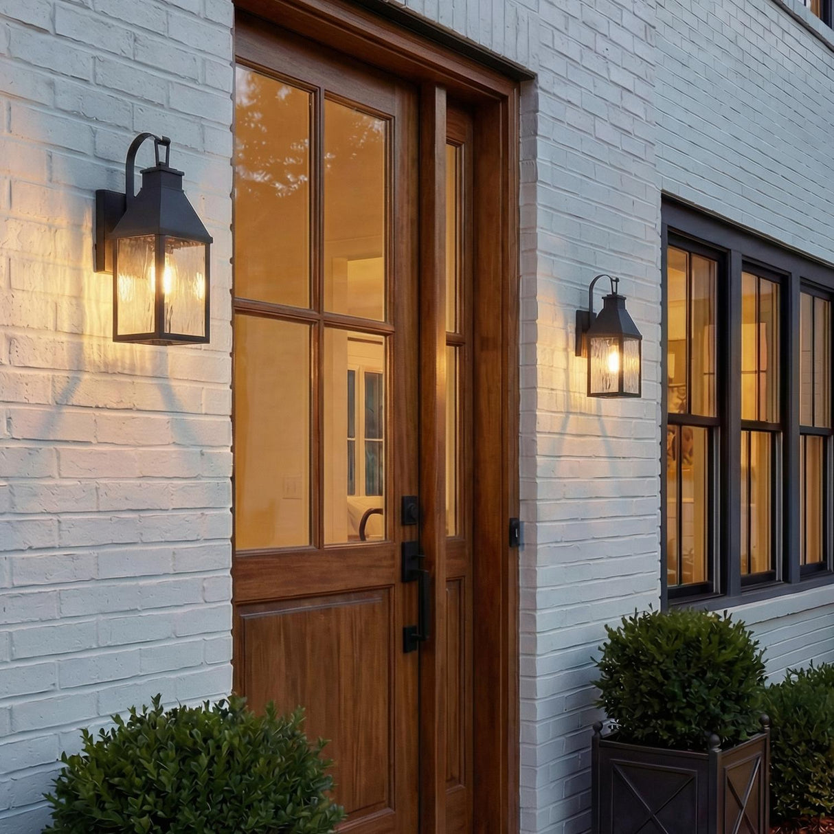 Westin Outdoor Wall Light, Small 14", Black and Water Glass geometric Outdoor Wall in a Modern Farmhouse Outdoor with a wood door.