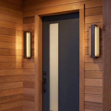 Zenith Outdoor LED Wall Light, Medium 18", Bronze linear Outdoor Wall in a Modern Outdoor with wood slat siding and a dark front door.