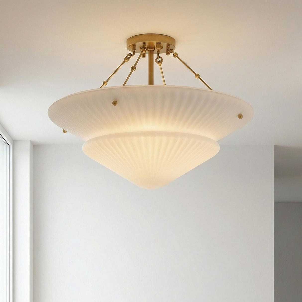 Caspian Semi-Flush 20", Aged Brass and Reeded Opal Glass scalloped flush mount in a Contemporary Hallway with white minimalist walls.