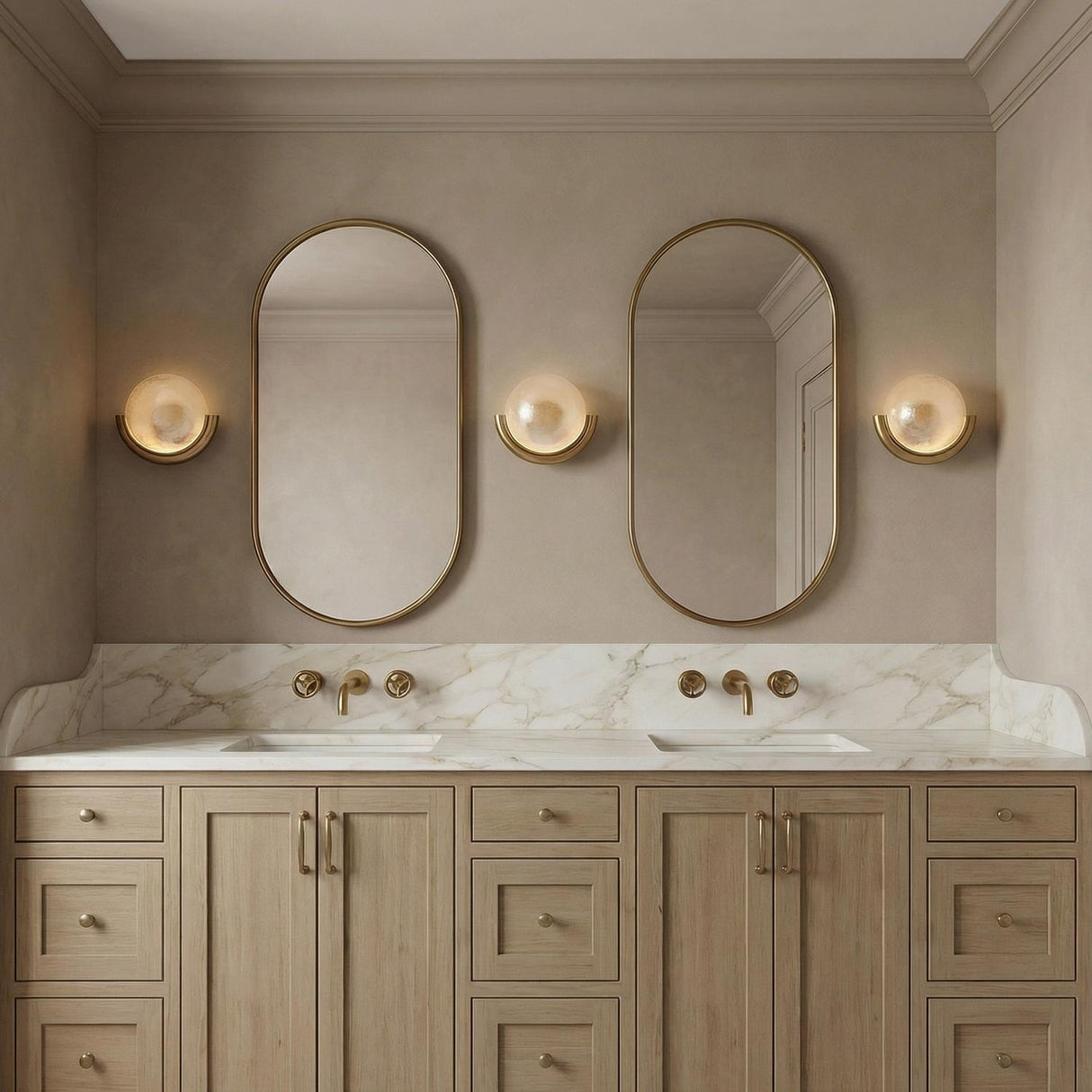 Soleil LED Wall Sconce 11", Antique Brass globe Wall Sconce in a Transitional Bathroom with a white marble double vanity.