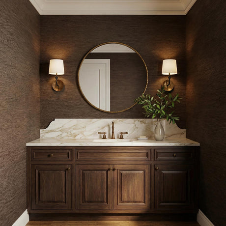 Galen Wall Sconce, Antique Brass geometric wall sconce in a Transitional Bathroom with a marble backsplash and wood vanity.