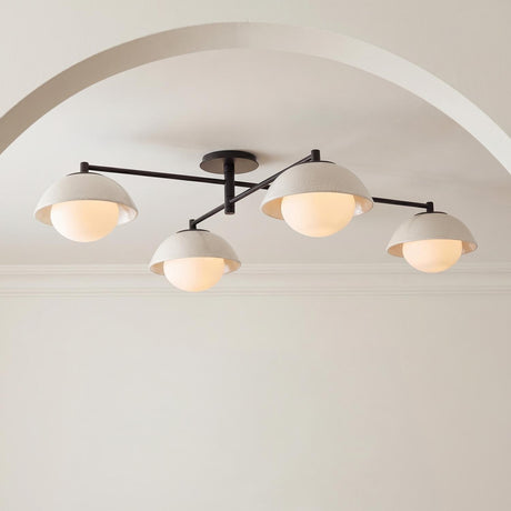 Hanley 4 Light Flush Mount 45", Black and Ivory Crackle Ceramic geometric globe flush mount in a Contemporary Entryway with an arched niche.