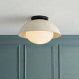 Hanley Flush Mount 12", Black and Ivory Crackle Ceramic globe Flush Mount in a Transitional Entryway with teal wood wall paneling.