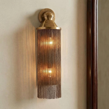 Jovian Wall Sconce 24", Antique Burnished Brass linear chain Wall Sconce in a Transitional Hallway with a dark wood mirror.