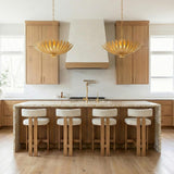 Yasmin Large Pendant 24", Gold Leaf leaf design Pendant in a Contemporary Kitchen with a terrazzo waterfall island and boucle stools.