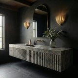 Yasmin Wall Sconce 13", Cream leaf design wall sconce in a Contemporary Bathroom with a fluted stone vanity and arched mirror.