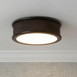 Bishop Large Flush Mount 18", Aged Iron geometric flush mount in a Transitional Hallway with textured wallpaper and crown molding.