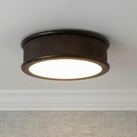 Bishop Large Flush Mount 18", Aged Iron geometric flush mount in a Transitional Hallway with textured wallpaper and crown molding.