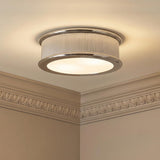 Bishop Large Flush Mount 18", Polished Nickel linear flush mount in a Transitional Hallway with ornate crown molding.