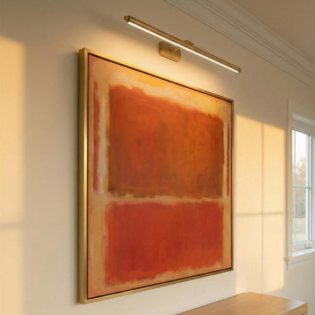 Bria LED Picture Light 30", Modern Brass linear Picture Light in a Contemporary Hallway with a large orange abstract painting.