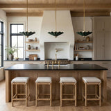 Babette Medium LED Pendant 16", Hunter Green and Brass scalloped Pendant in a Modern Farmhouse Kitchen with a black island and woven stools.
