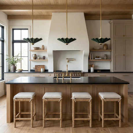 Babette Medium LED Pendant 16", Hunter Green and Brass scalloped Pendant in a Modern Farmhouse Kitchen with a black island and woven stools.