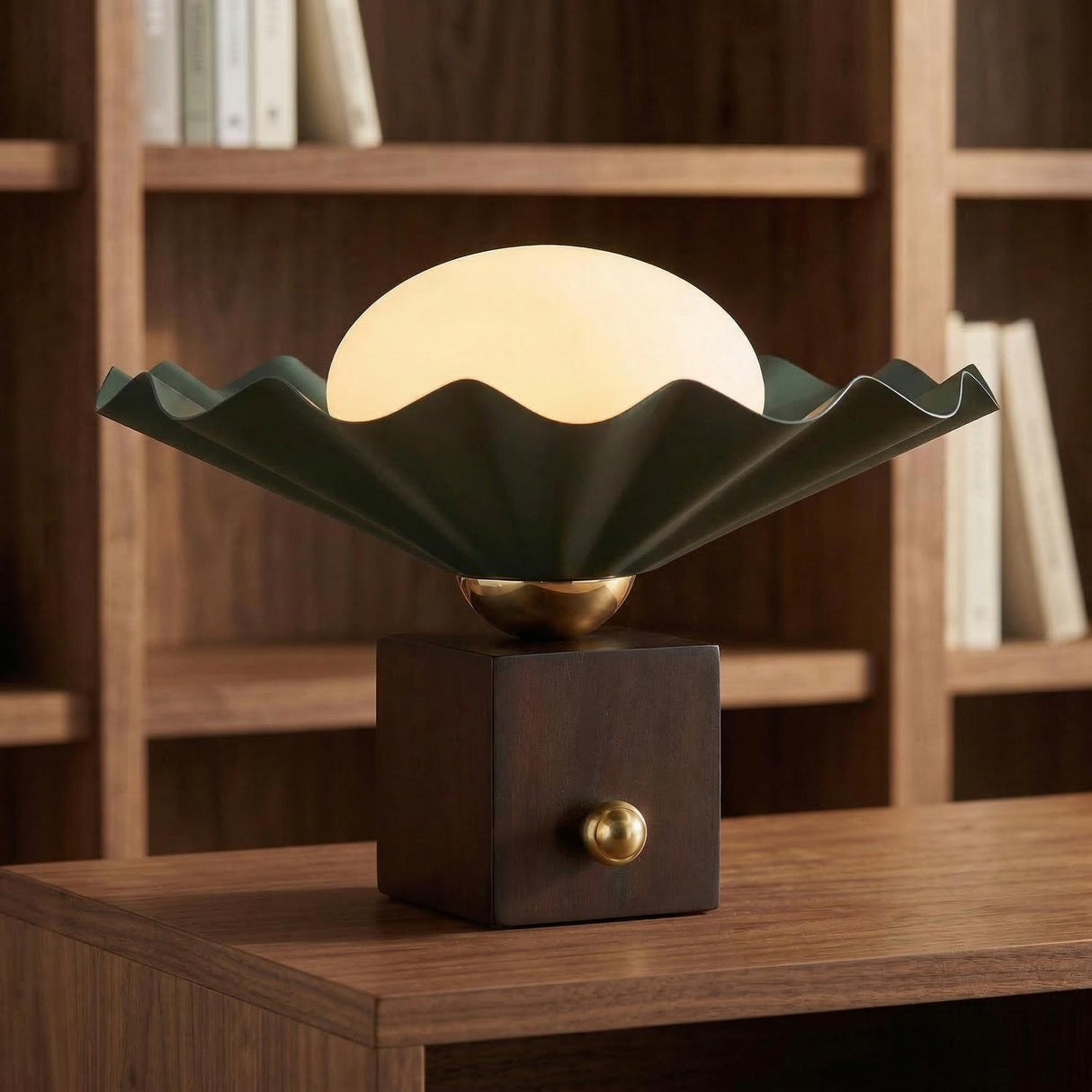 Babette Small Table Lamp 9", Hunter Green and Walnut scalloped Table Lamp in a Mid-Century Office with a dark wood bookshelf.
