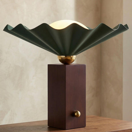Babette Medium Table Lamp 14", Hunter Green and Walnut scalloped Table Lamp in a Contemporary Living Room with a textured plaster wall.