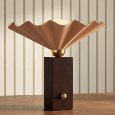 Babette Medium Table Lamp 14", Blush and Walnut scalloped Table Lamp in a Mid-Century Office with a wood desk and fluted wall paneling.